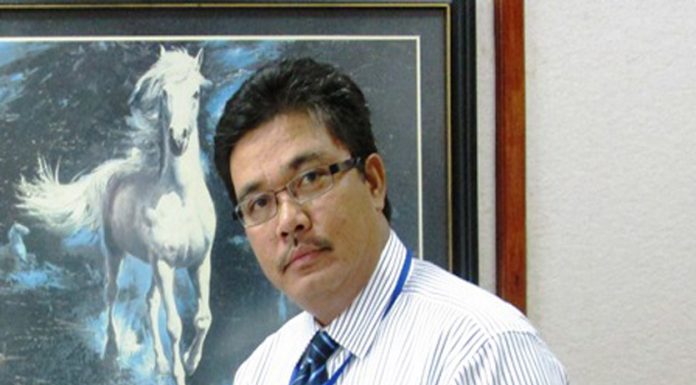 Naek Tigor Sinaga Kepala Perwakilan BI Prov Papua