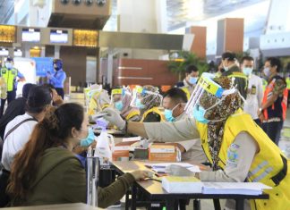 Ribuan Buruh Migran Mendarat di Bandara SOETA